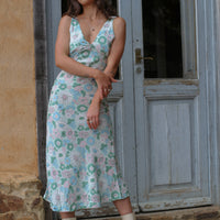 girl wearing ethical sustainable 70's inspired dress. made from ecovero fabric which is good for the planet
