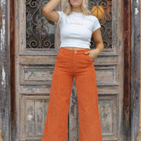 rust coloured sustainable corduroy wide leg pants