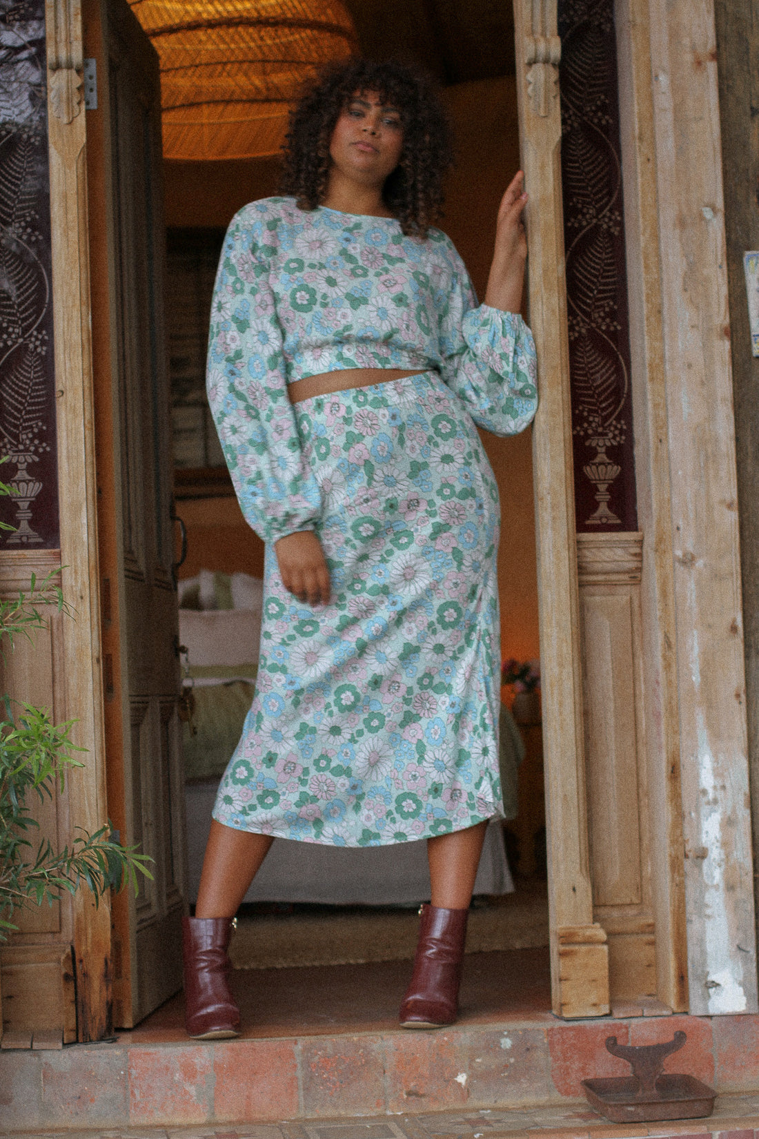 curve model wearing sustainable brand Arlo and Olive